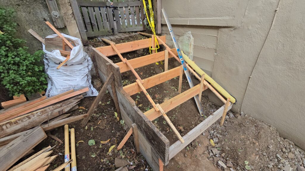 All Access Construction complete formwork for the new Belmont concrete stairs along the side yard, ready for rebar and concrete.