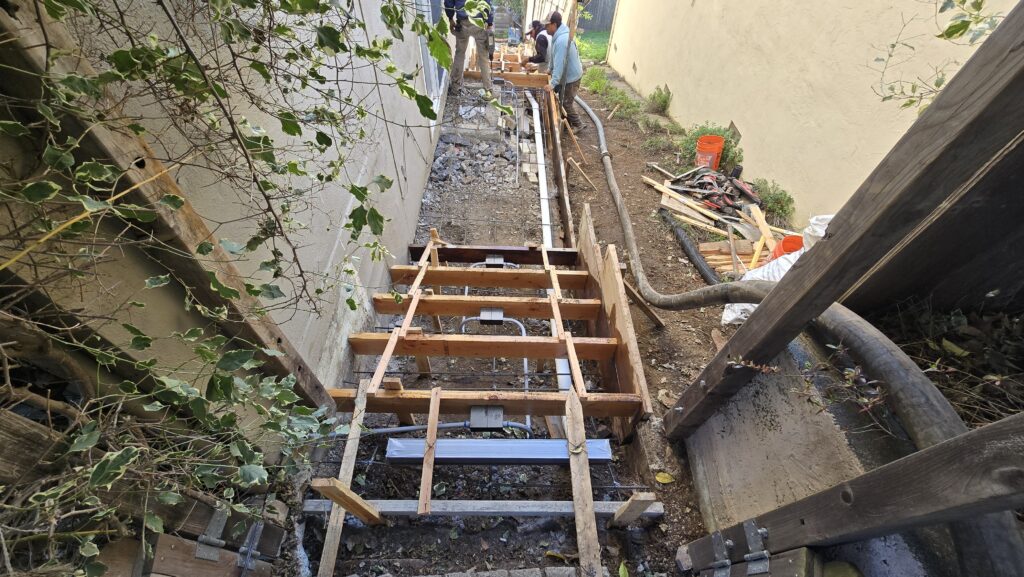 All Access Construction forming the new Belmont hillside staircase, with wood forms set for each concrete step.