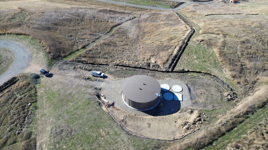 All Access Construction completed 50-foot water tank foundation in Milpitas with tank installed and concrete access pads