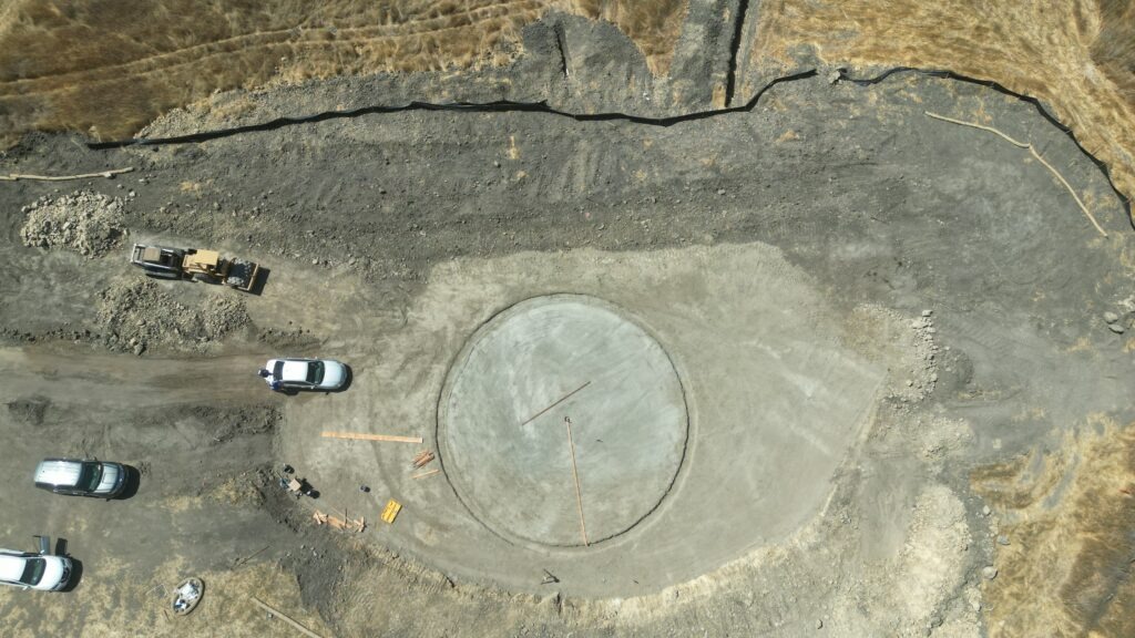 All Access Construction rough grading circular tank pad for 50-foot water tank in Milpitas hillside