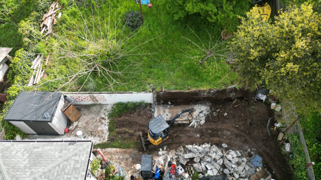 All Access Construction Oakland hillside before concrete retaining wall install