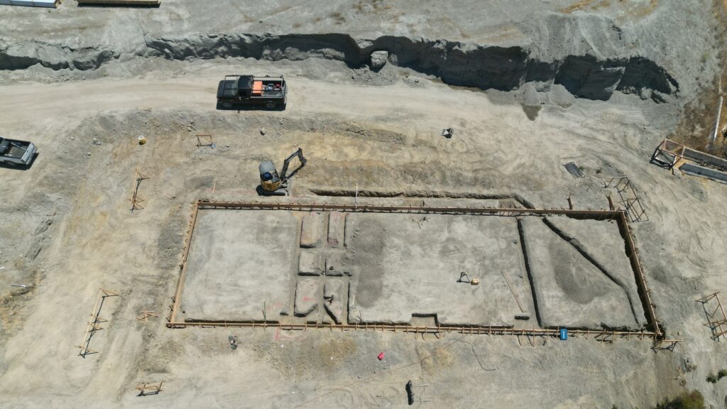 All Access Construction overhead drone shot showing agricultural shed foundation locations and site grading in Milpitas.