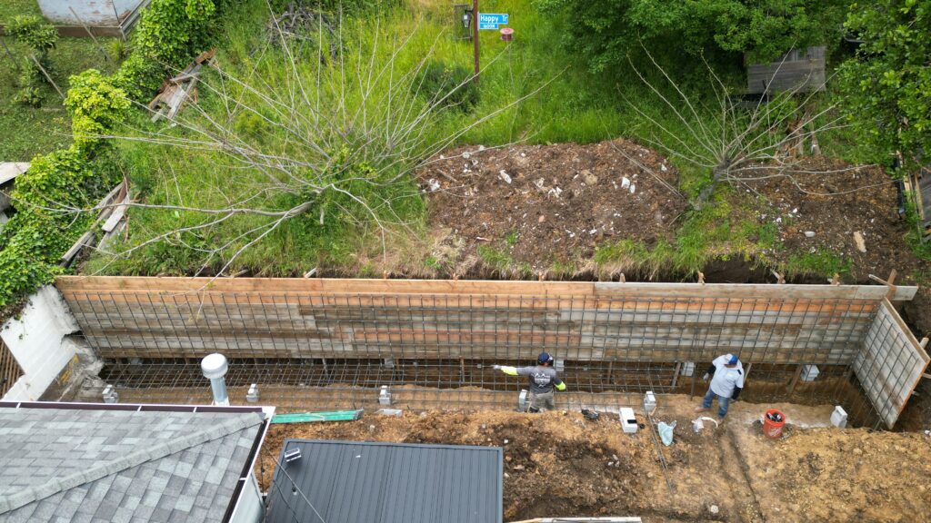 All Access Construction Oakland concrete retaining wall completed drone view