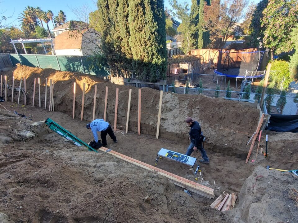 Concrete retaining wall excavation and layout on hillside property in Oakley California Contra Costa County by All Access Construction