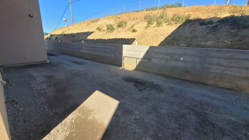 Completed hillside concrete retaining wall in Milpitas CA Santa Clara County