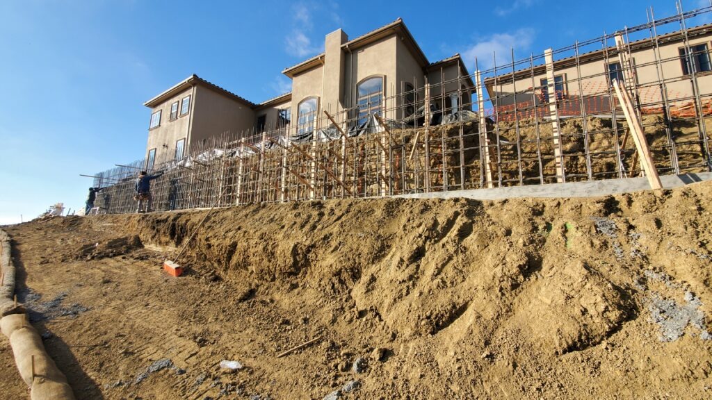 Seven foot high concrete retaining wall in Milpitas with double mat #5 rebar spaced 12 inches on center