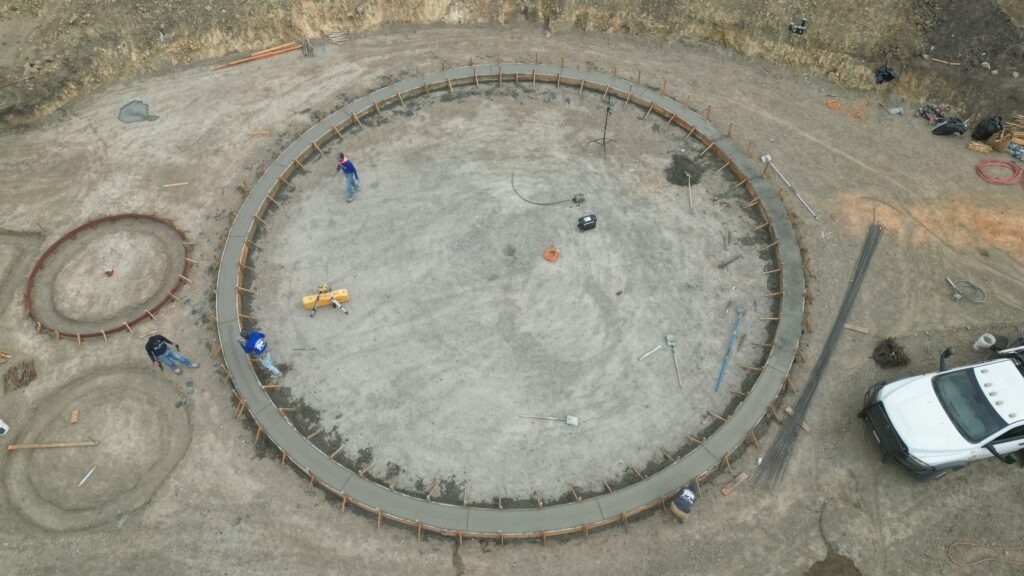 Completed concrete water tank pad and accessory foundations built by All Access Construction in Milpitas