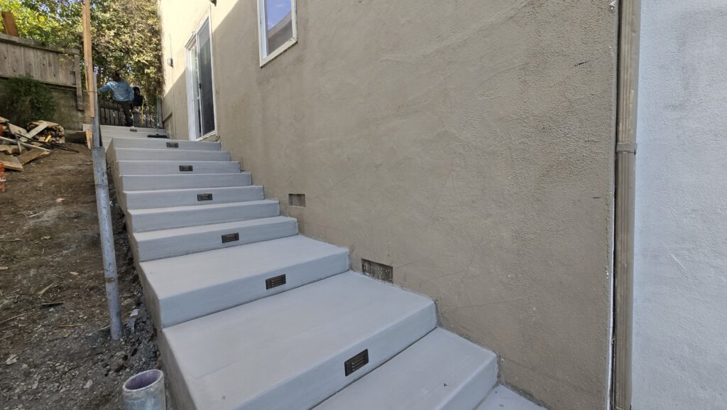 All Access Construction – Belmont concrete stairs with Alliance SL25 step lights installed