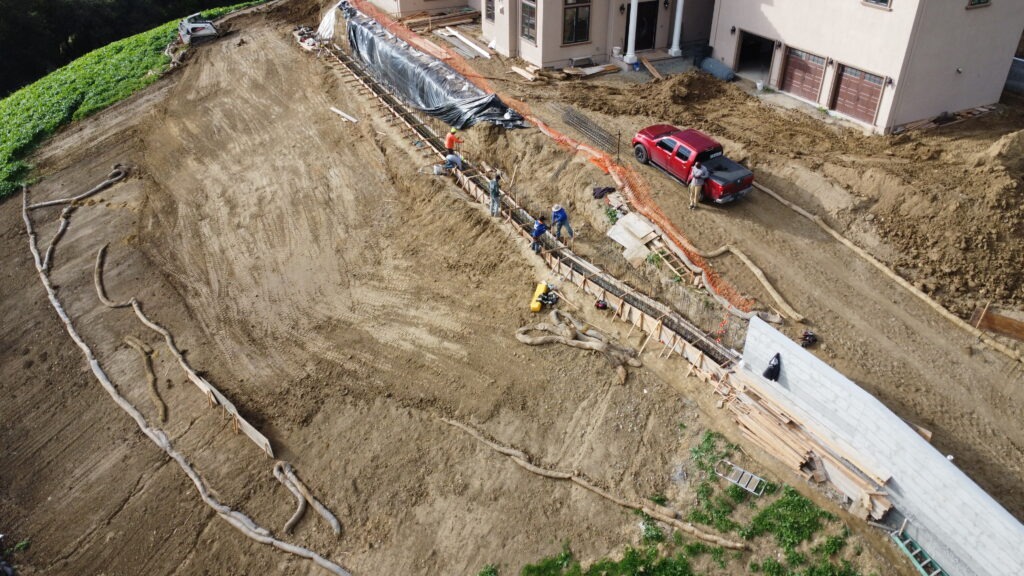 Drone image showing rebar and formwork for 2x2 concrete grade beam in Milpitas California