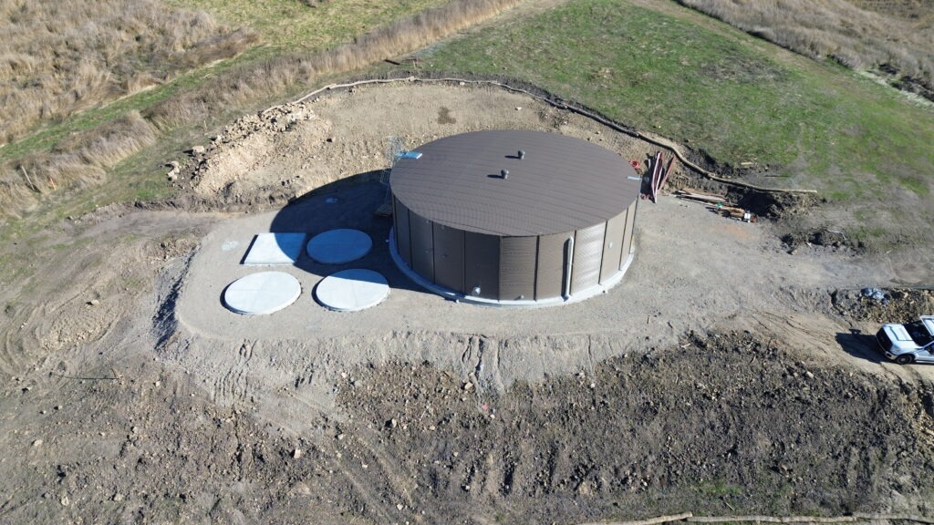 All Access Construction finishing 50-foot radius circular concrete tank foundation with crew onsite in Milpitas